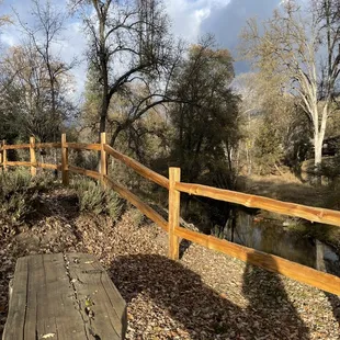 Reminder fence to keep walkers away from the bank of the river... erosion might make that first step a doozy!