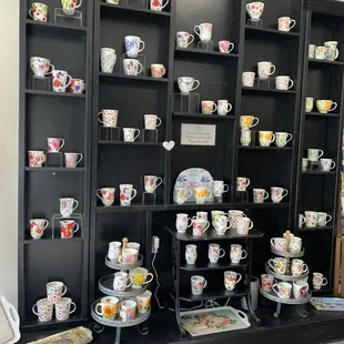 a display of tea cups and saucers