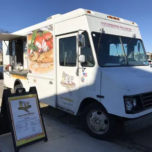 a food truck parked in a parking lot
