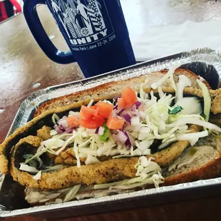 My favorite place at Comfest for lunch! Fish boats are the boats.