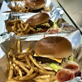 This Hamburger comes with fries and a fresh watermelon, lemonade, Horchata or Pineapple water!