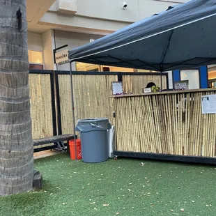 Plastic trash cans and buckets really add to the authentic vibes and ambiance