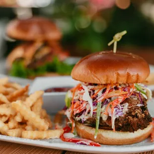 QB Chicken Sandwich,
House Fried or Grilled Chicken, Cabbage Pepper Slaw, Dill Pickles, Chipotle Aioli, Brioche Bun