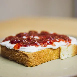 a piece of toast with jam on it