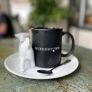 Coffee with a milky cow cup. Very cute!