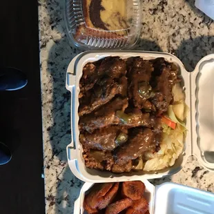 Trying the Jerk Chicken, Rice and Peas, cabbage, plantain and marble cake for dessert...looking good!!