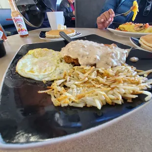 Chicken fried steak.  I asked for crispy hashbrowns.