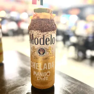 a can of beer on a table