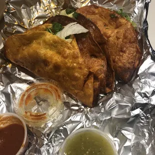 Crisp Chicken Tacos $12 with the BEST salsas in town.