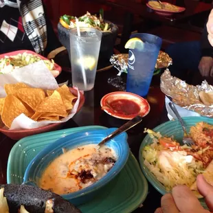 a group of people eating at a restaurant