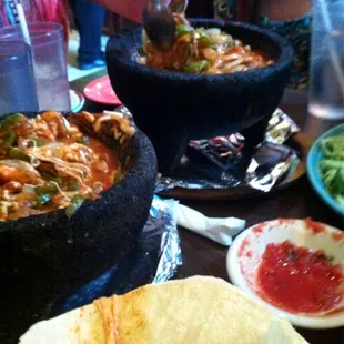 a woman eating at a mexican restaurant