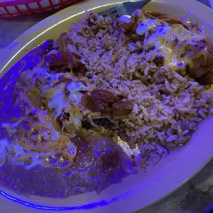 Ground beef enchiladas and a pork tamale with rice and beans