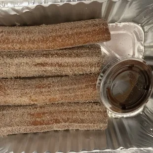 Churros with chocolate sauce yum