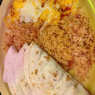 3 brisket tacos, one cheese enchilada with double rice