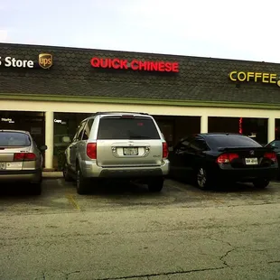 cars parked in front of the store