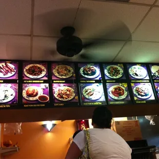 menus on the wall of a restaurant