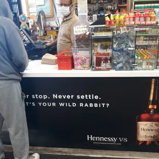 a man standing at a counter