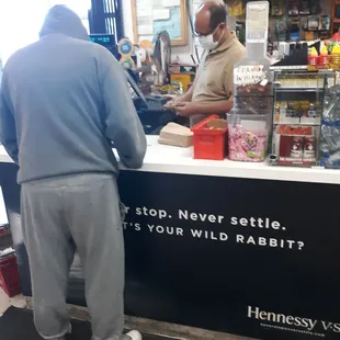 a man standing at a counter