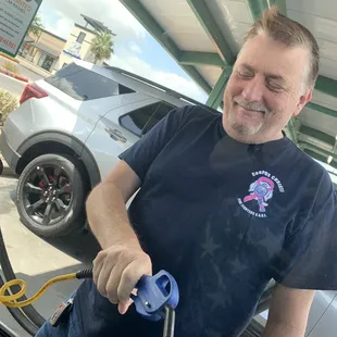 Drying the mirrors and windows.