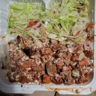 Supposed to be chicken n rice with extra chicken,  white and red sauce. No extra anything. Barely any sauce at all