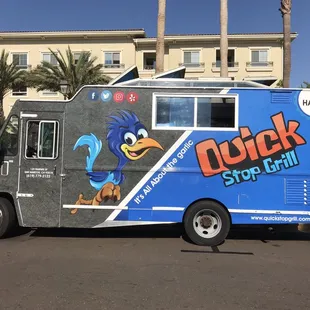 a food truck parked in a parking lot