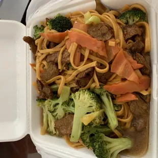 beef and noodles in a styrofoam container