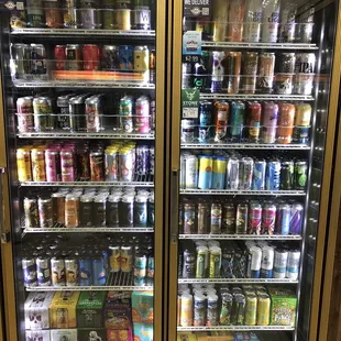 two refrigerators filled with drinks