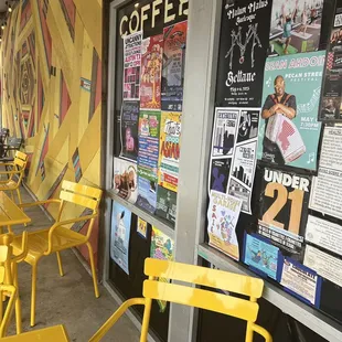 yellow chairs outside a coffee shop