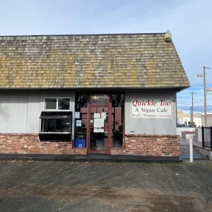 Outside of the restaurant. You go to the pick up window to get your food