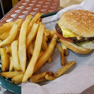 Small quickie deluxe plus cheese w/ fries. Nice portion but STINGY w/ quickie sauce &amp; seasoning. BARELY taste it. Hollywood tastes better