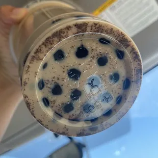 Tea grounds in the Earl Grey milk tea