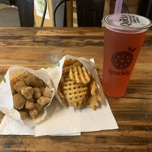 Popcorn chicken, waffle fries, strawberry green tea with strawberry boba