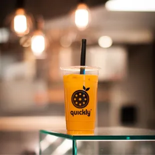 a smoothie in a plastic cup