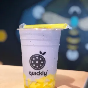a smoothie in a plastic cup