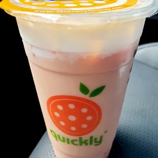 Watermelon milk tea with milk foam and lychee coconut jellies - Not my fave flavor but I still love Quickly Boba.