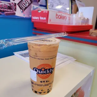 a cup of coffee on a counter