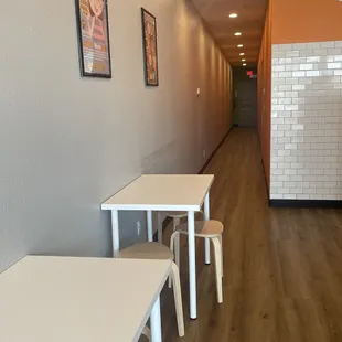 Seating and hallway to bathroom