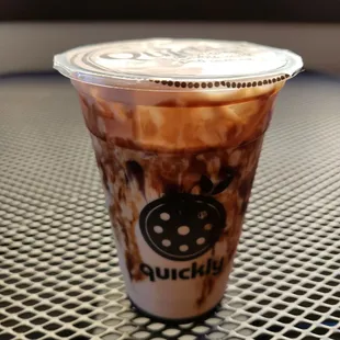 Okinawa (brown sugar) milk tea regular size: choice of Jelly is litchi Jelly.