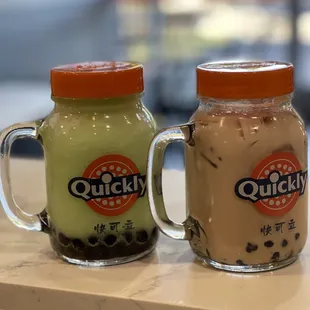 two cups of coffee on a counter