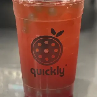 a cup of strawberry green tea