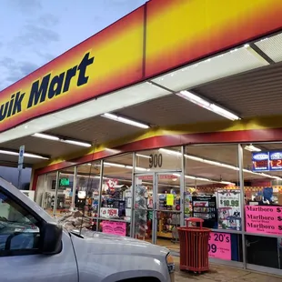 a car parked in front of the store