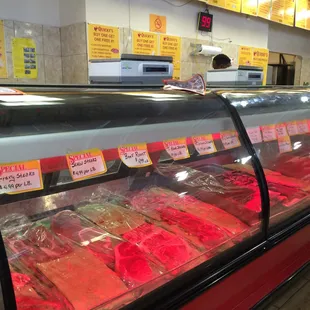 a display of meat in a case