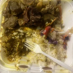 curry goat was tough,cabbage was sweet but ok, rice was good