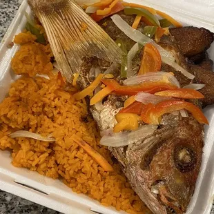 a meal in a styrofoam container