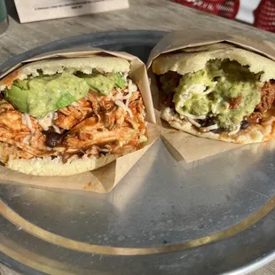 Left to right: Pollo Guisado and Pabellon