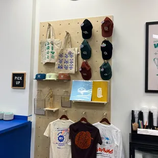Cool merch wall! I like the magnets!