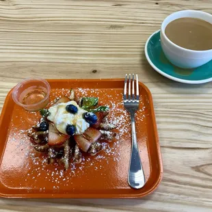 Wow-ffle! Waffle, ricotta, strawberries, blueberries, mint leaves and maple syrup. Heaven!