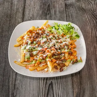 a plate of food on a wooden table