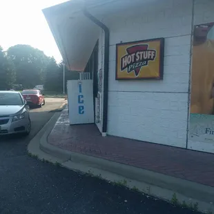 a car parked in front of the store