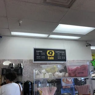a woman standing in front of the counter